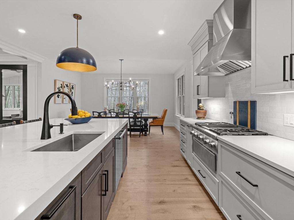15 Quick Farm Road Westborough, MA 01581 - Photo 16 of 40 a kitchen with stove and a sink