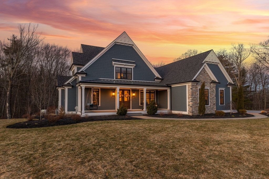 15 Quick Farm Road Westborough, MA 01581 - Photo 2 of 40 a front view of a house with a yard