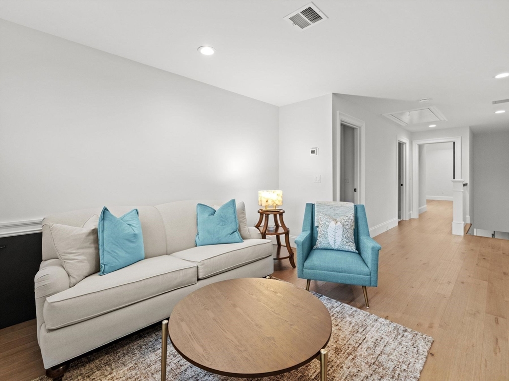 15 Quick Farm Road Westborough, MA 01581 - Photo 24 of 40 a living room with furniture and a couch