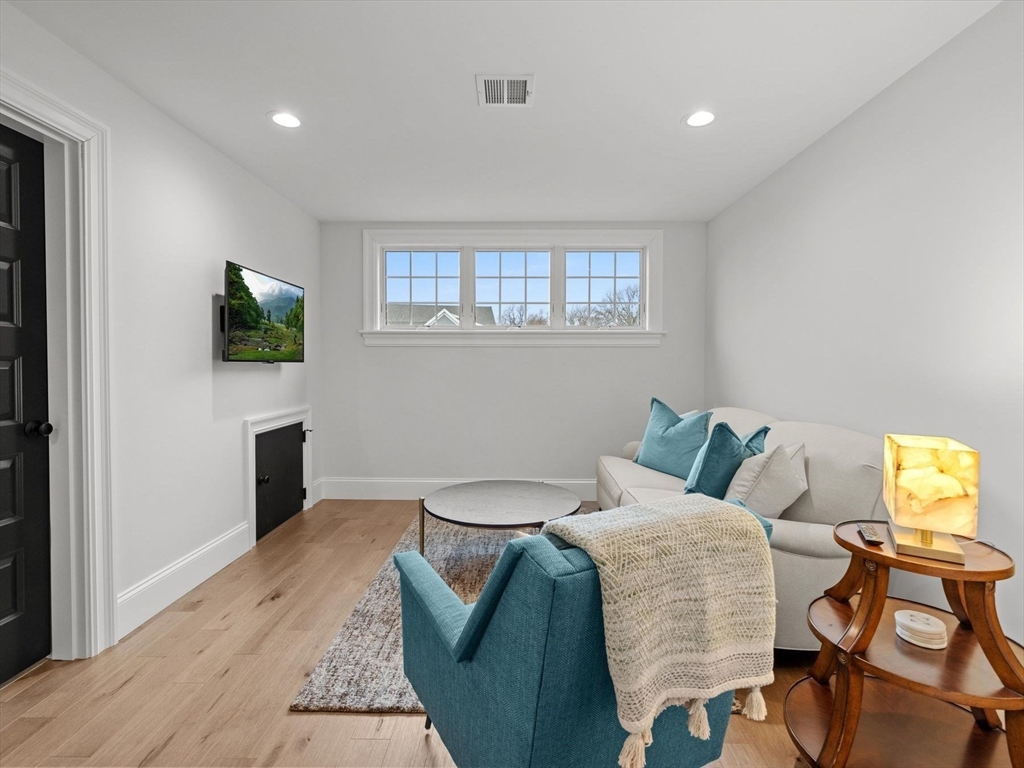 15 Quick Farm Road Westborough, MA 01581 - Photo 25 of 40 a bedroom with a bed and wooden floor