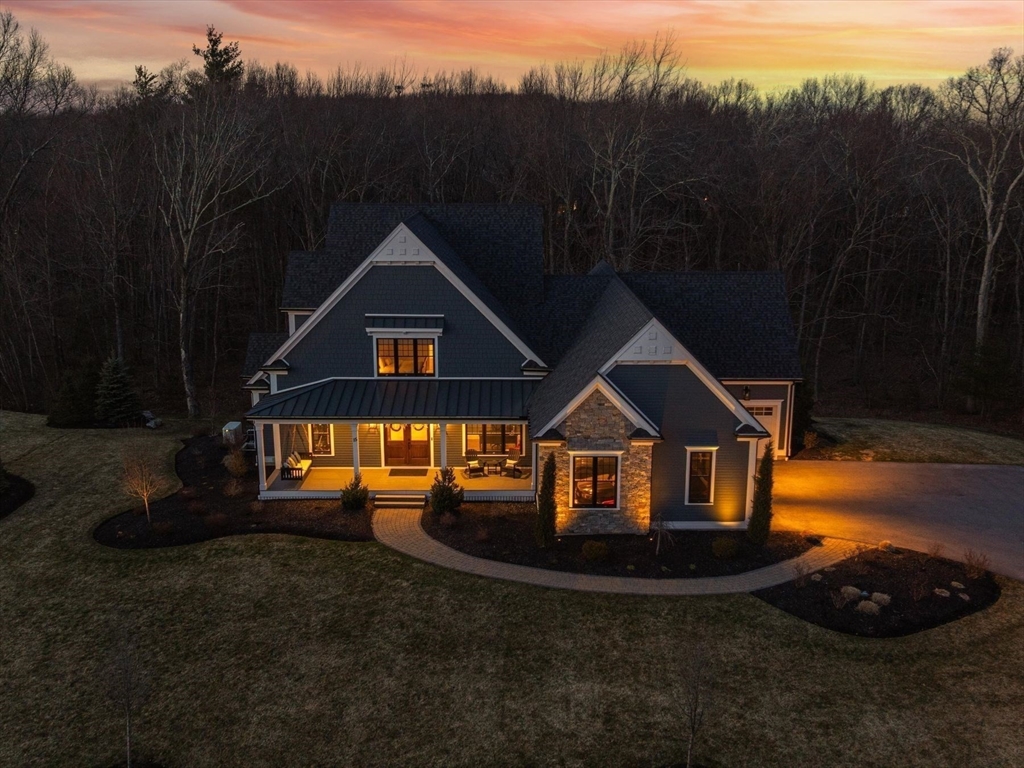 15 Quick Farm Road Westborough, MA 01581 - Photo 3 of 40 a front view of a house with garden