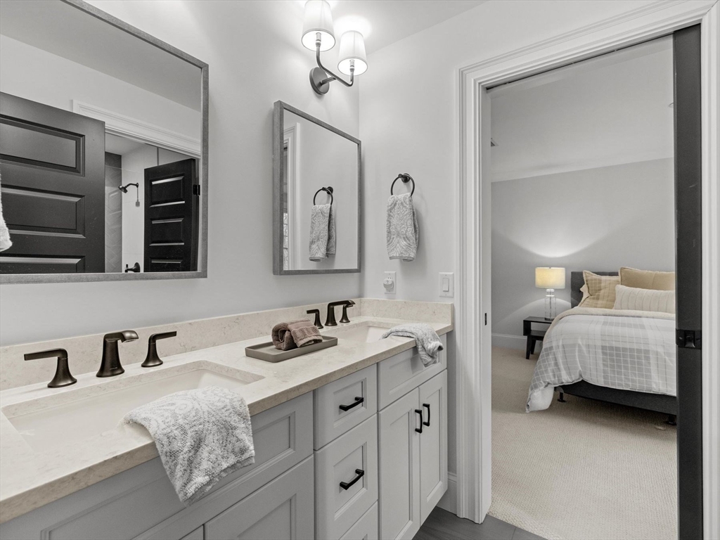 15 Quick Farm Road Westborough, MA 01581 - Photo 31 of 40 a en suite bathroom with double sink and a mirror