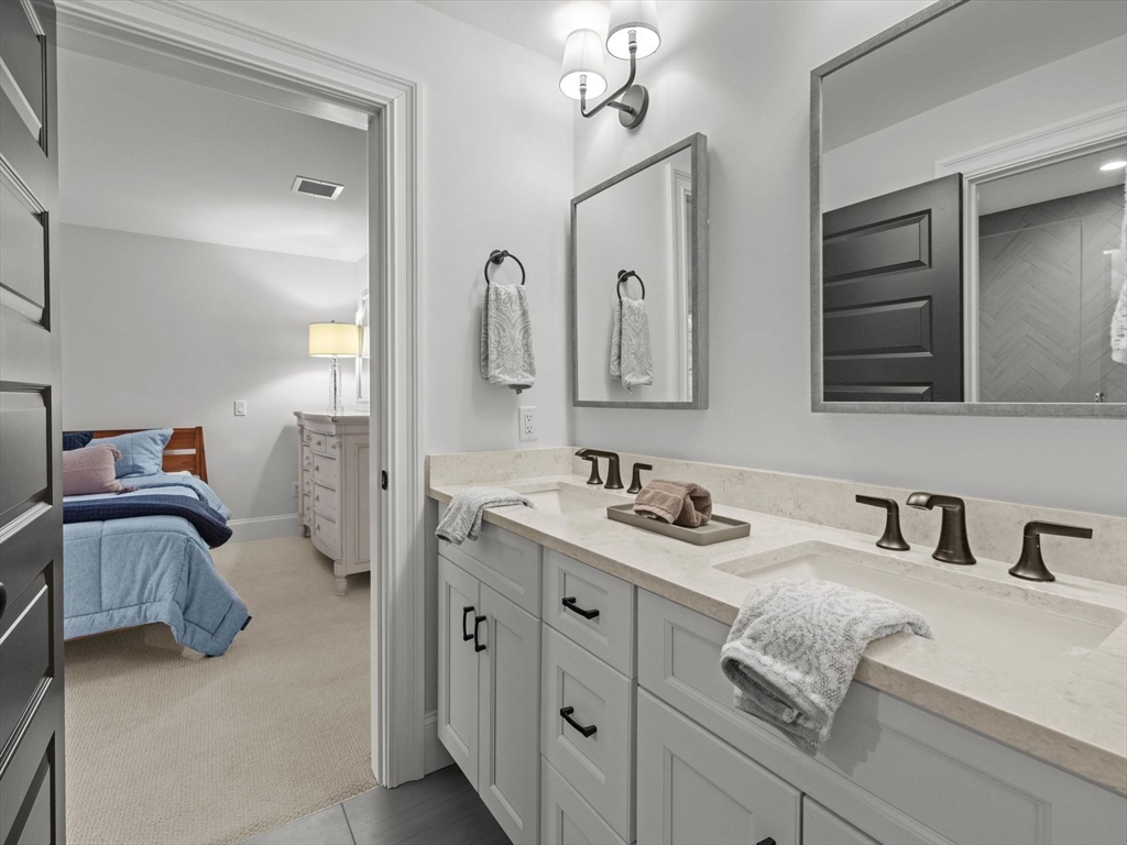 15 Quick Farm Road Westborough, MA 01581 - Photo 32 of 40 a en suite bathroom with double sink and a mirror