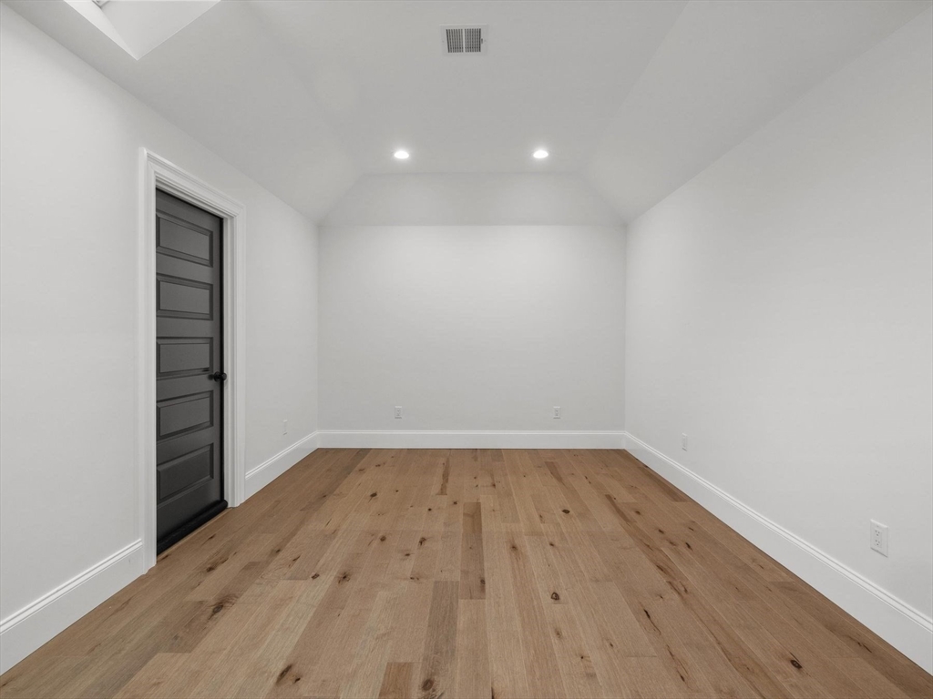 15 Quick Farm Road Westborough, MA 01581 - Photo 34 of 40 a view of an empty room with wooden floor and closet