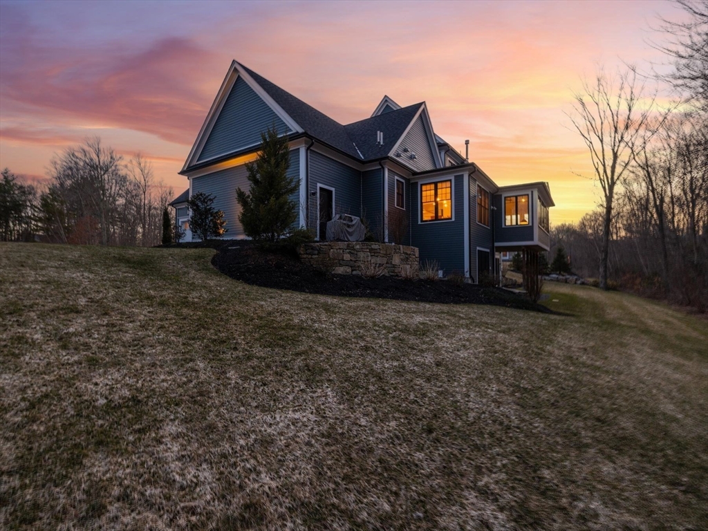 15 Quick Farm Road Westborough, MA 01581 - Photo 5 of 40 a front view of a house with a yard