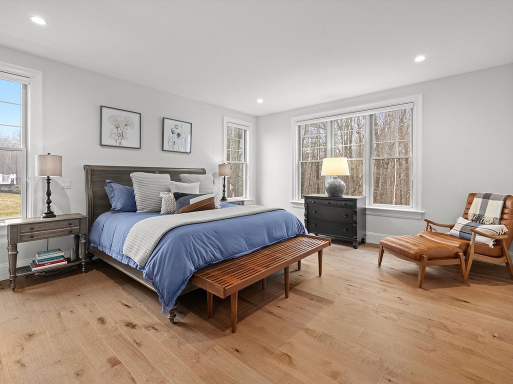 15 Quick Farm Road Westborough, MA 01581 - Photo 8 of 40 a spacious bedroom with a bed and glass window