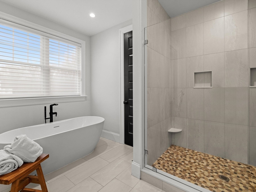 15 Quick Farm Road Westborough, MA 01581 - Photo 10 of 40 a bathroom with a sink a toilet and shower