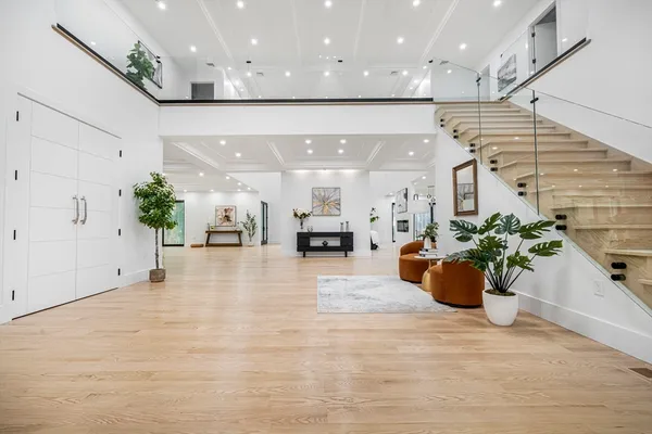 a view of a living room and kitchen