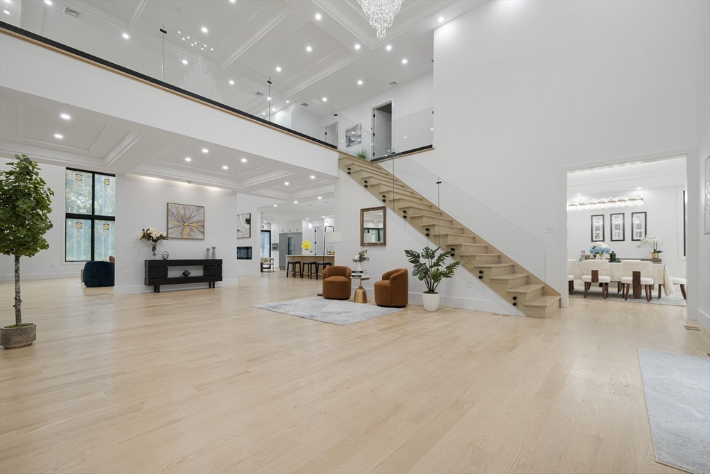 197 Woburn Street Lexington, MA 02420 - Photo 17 of 42 a large room with entryway table and chairs