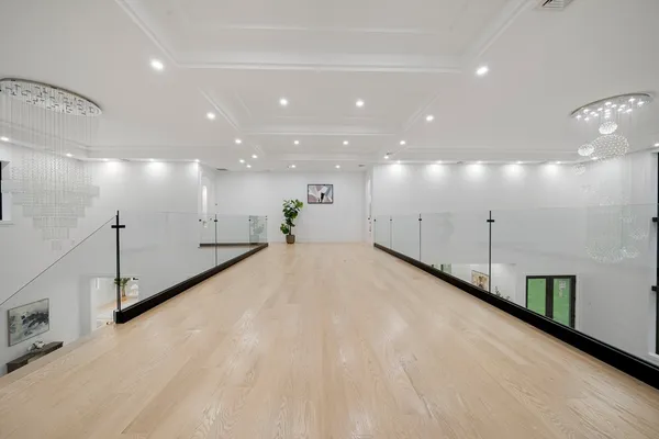 a view of a room with a large window