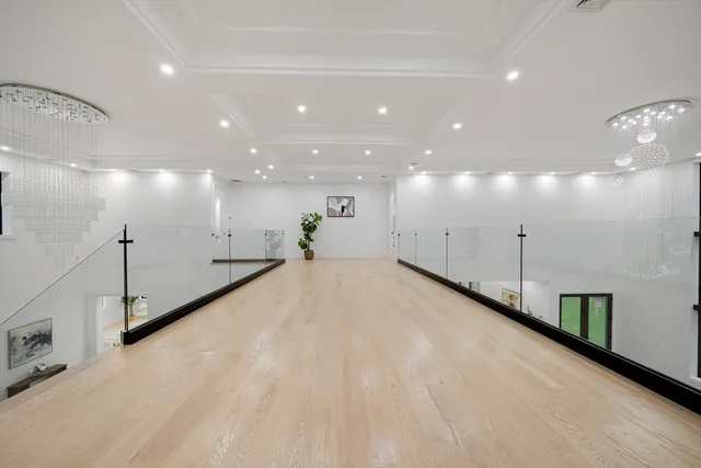 a view of a room with a large window