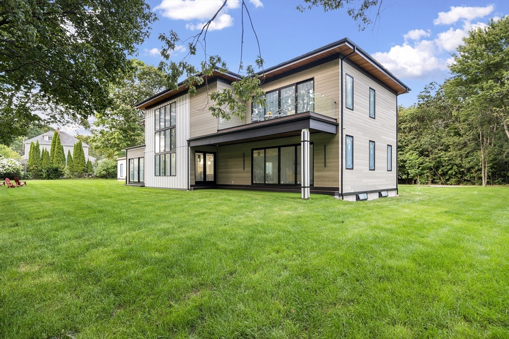 197 Woburn Street Lexington, MA 02420 - Photo 2 of 42 a view of a house with yard and tree s