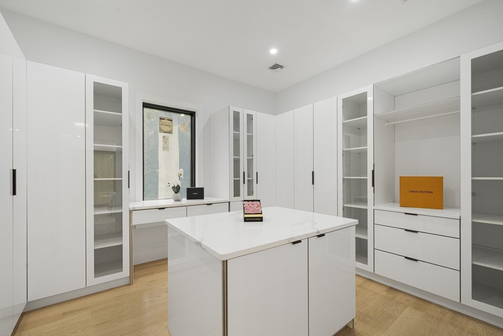 197 Woburn Street Lexington, MA 02420 - Photo 22 of 42 a view of kitchen with stainless steel appliances kitchen island sink refrigerator and stove
