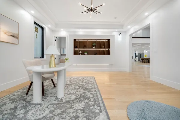 a living room with furniture and a rug