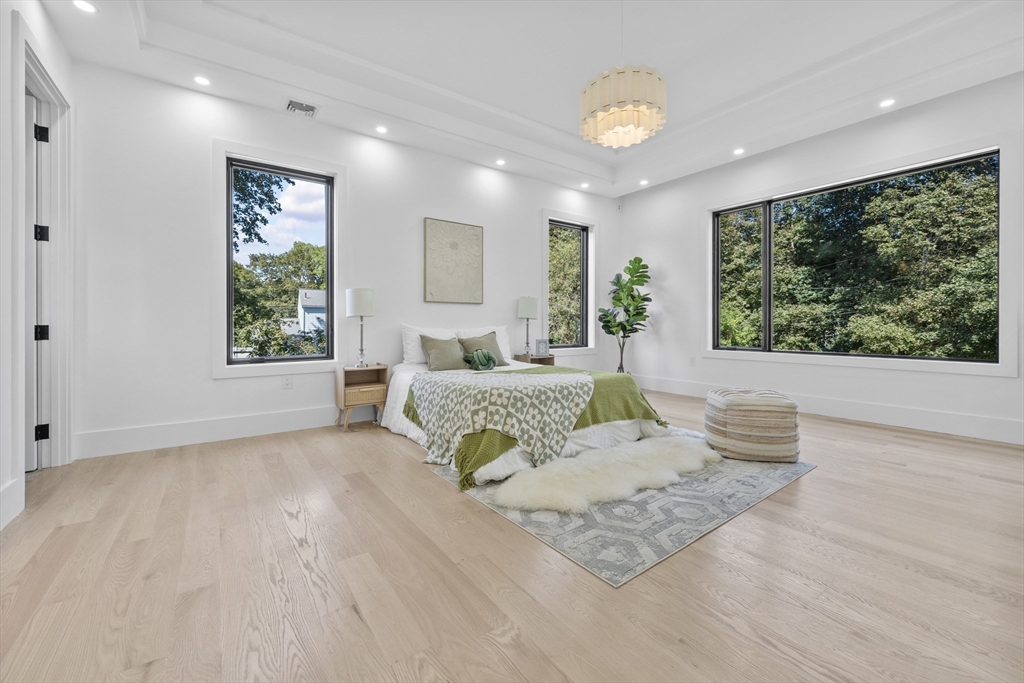 197 Woburn Street Lexington, MA 02420 - Photo 30 of 42 a living room with furniture and a large window