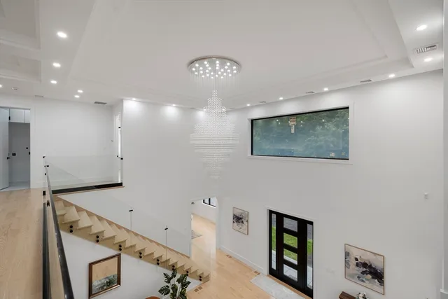 a view of hall way with furniture