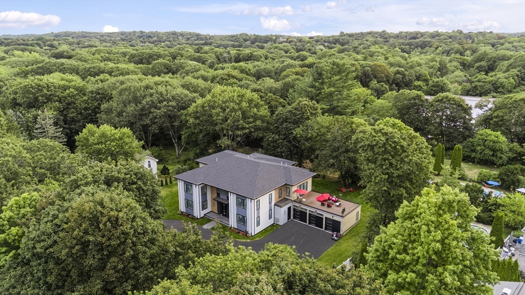 197 Woburn Street Lexington, MA 02420 - Photo 42 of 42 an aerial view of a house with a garden