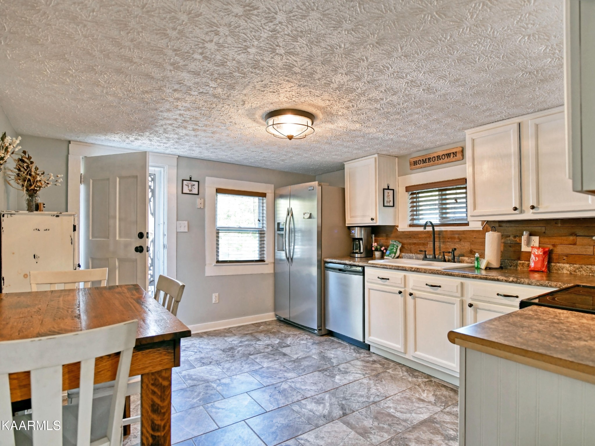 242 Central View Road Andersonville, TN 37705 - Photo 10 of 21 a kitchen with a sink cabinets and window