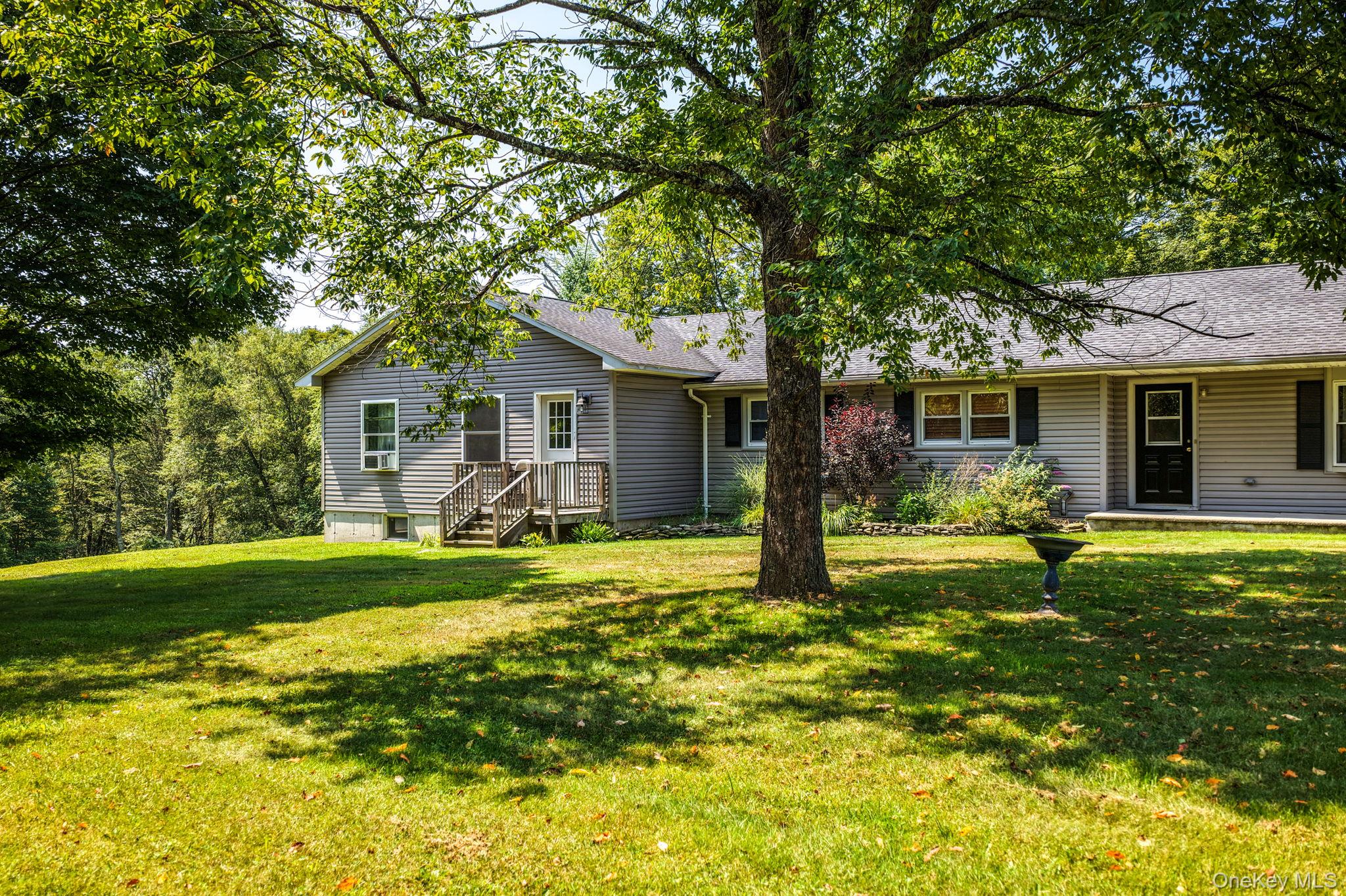 465 Cypert Road Woodbourne, NY 12788 - Photo 1 of 1 Ranch-style home featuring a front yard and a shingled roof
