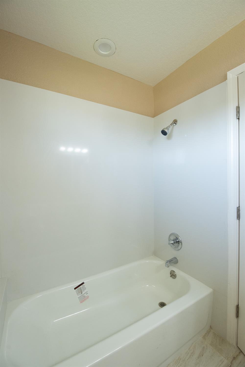 1621 Davis Street Ripon, CA 95366 - Photo 26 of 43 full bath with bathing tub / shower combination
