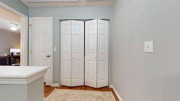 a view of a kitchen from the hallway
