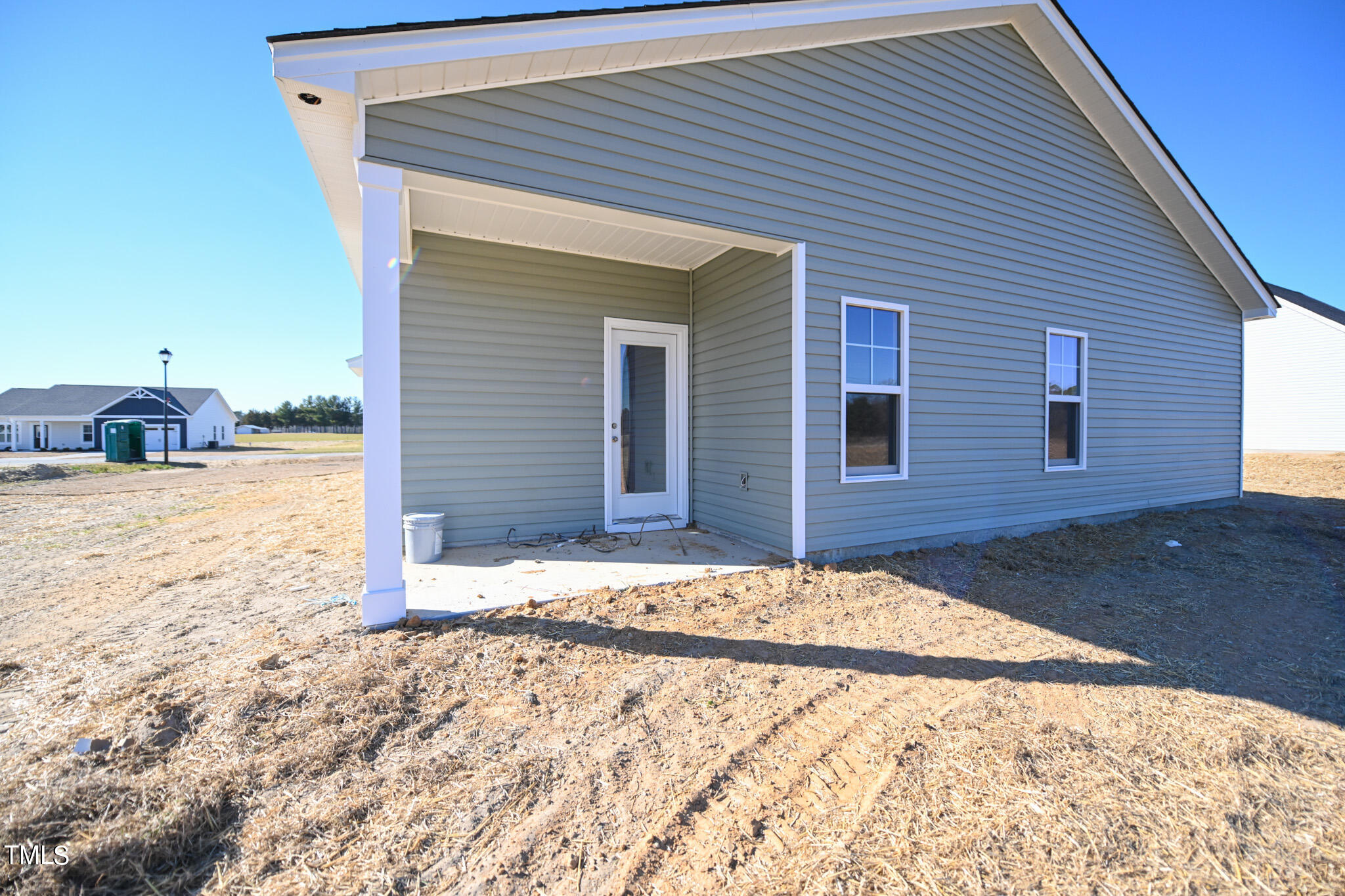150 Johnson Ridge Way Four Oaks, NC 27524 - Photo 22 of 24 a view of a backyard of the house