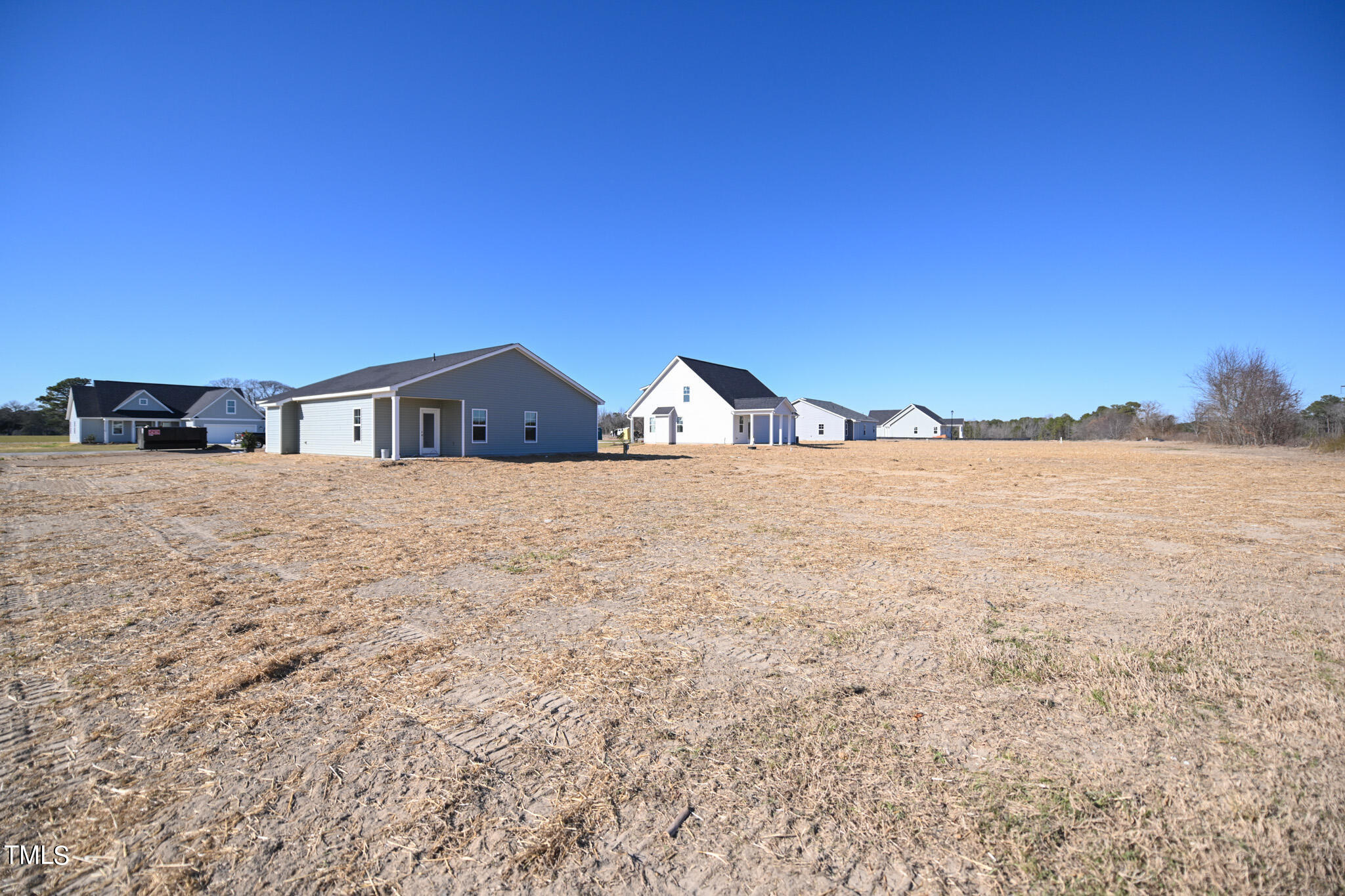 150 Johnson Ridge Way Four Oaks, NC 27524 - Photo 23 of 24 a view of a house with a yard