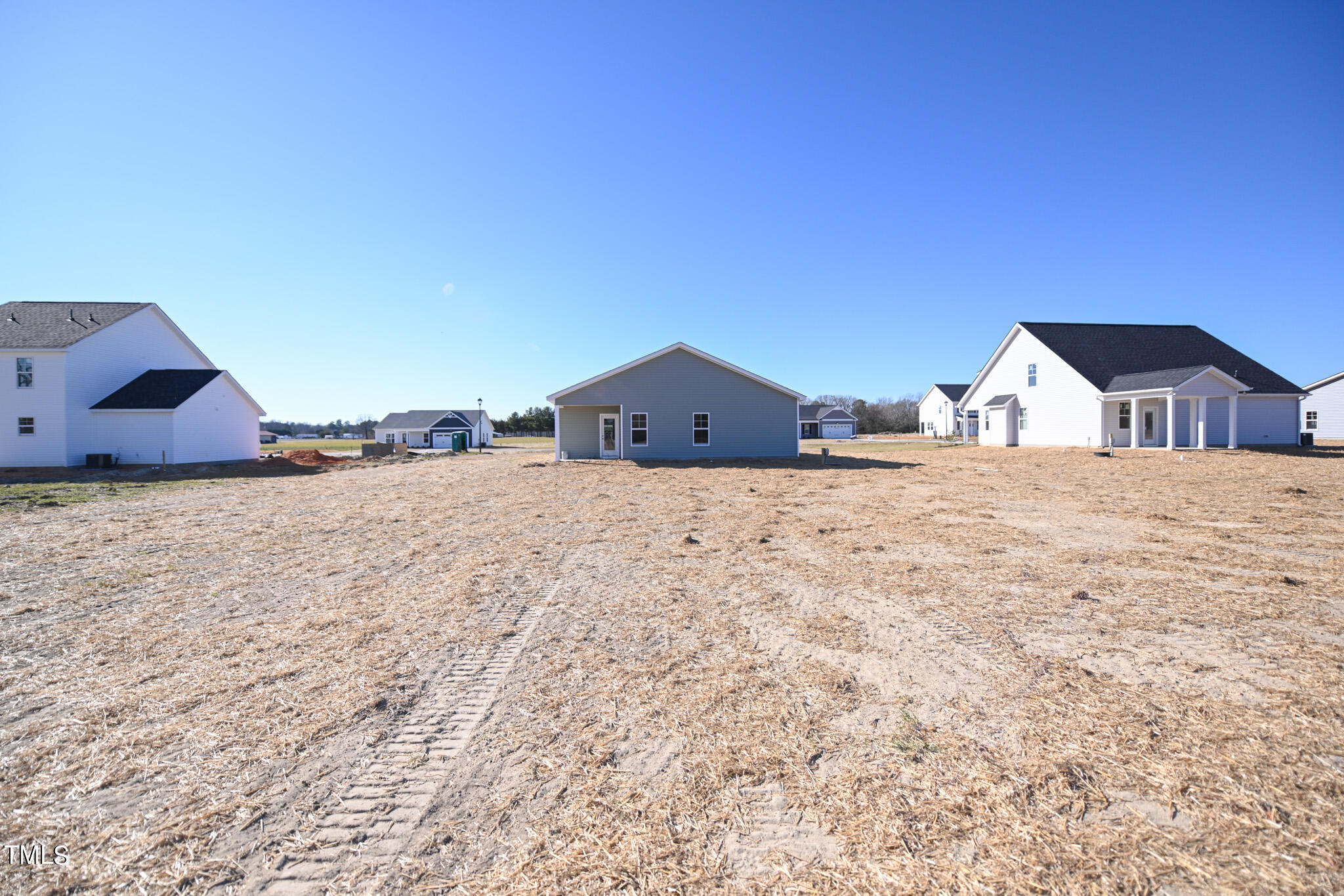 150 Johnson Ridge Way Four Oaks, NC 27524 - Photo 24 of 24 a view of a house with a snow on the road