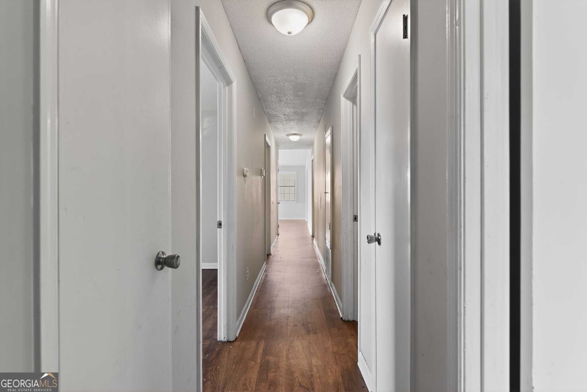 2809 Butler Manor Drive Hephzibah, GA 30815 - Photo 29 of 35 a view of a hallway with wooden floor