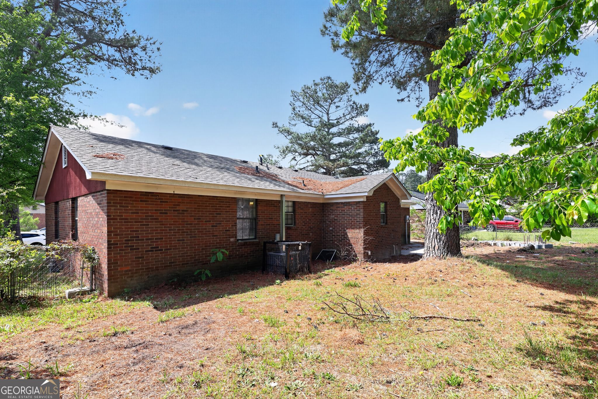 2809 Butler Manor Drive Hephzibah, GA 30815 - Photo 32 of 35 a view of a house with a yard covered in snow