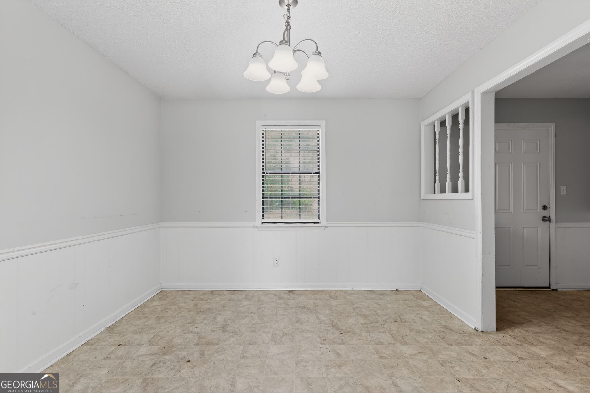 2809 Butler Manor Drive Hephzibah, GA 30815 - Photo 5 of 35 a view of an empty room with a window
