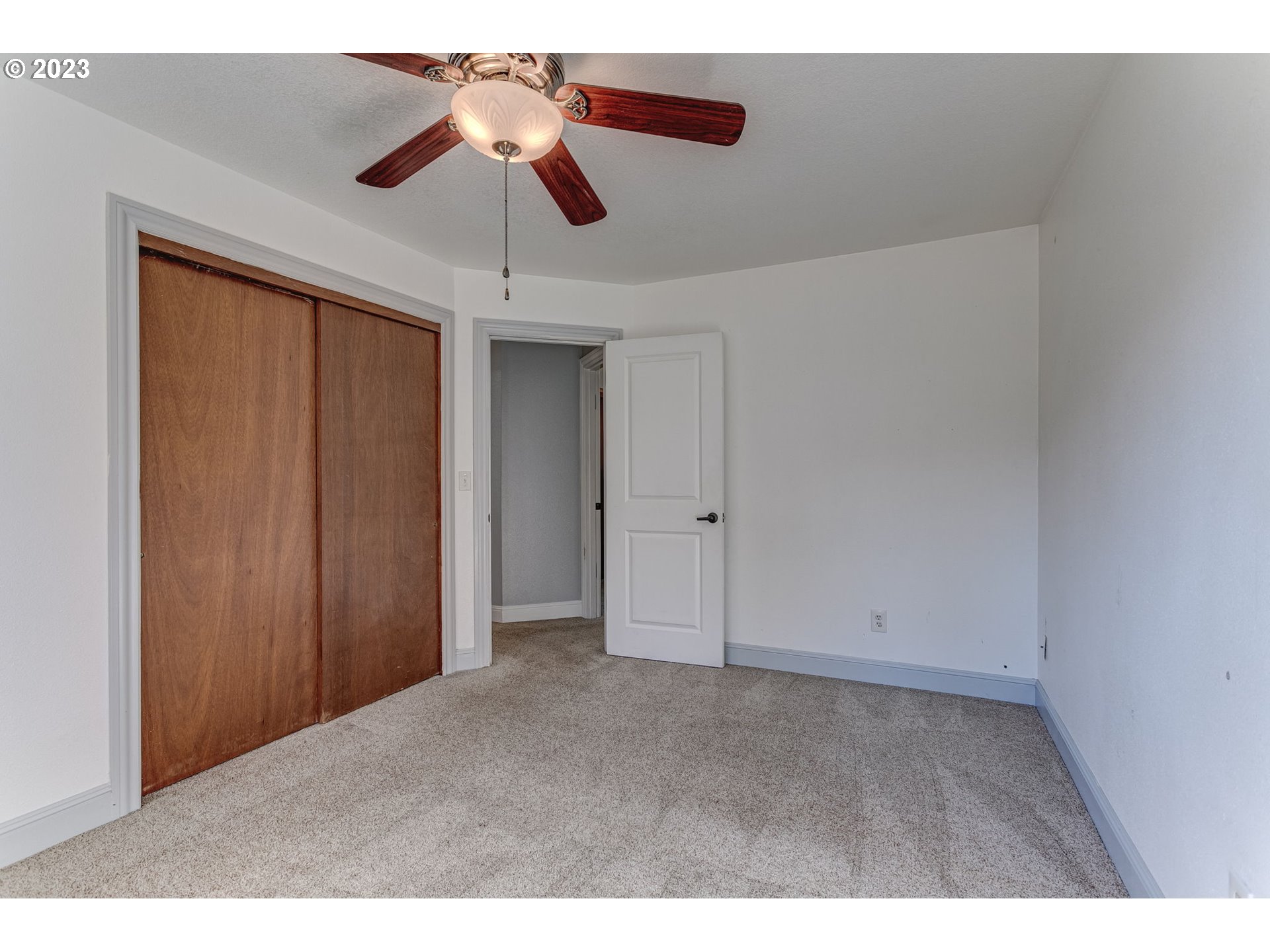 21321 Southeast Alder Street Gresham, OR 97030 - Photo 25 of 39 a view of an empty room and chandelier fan