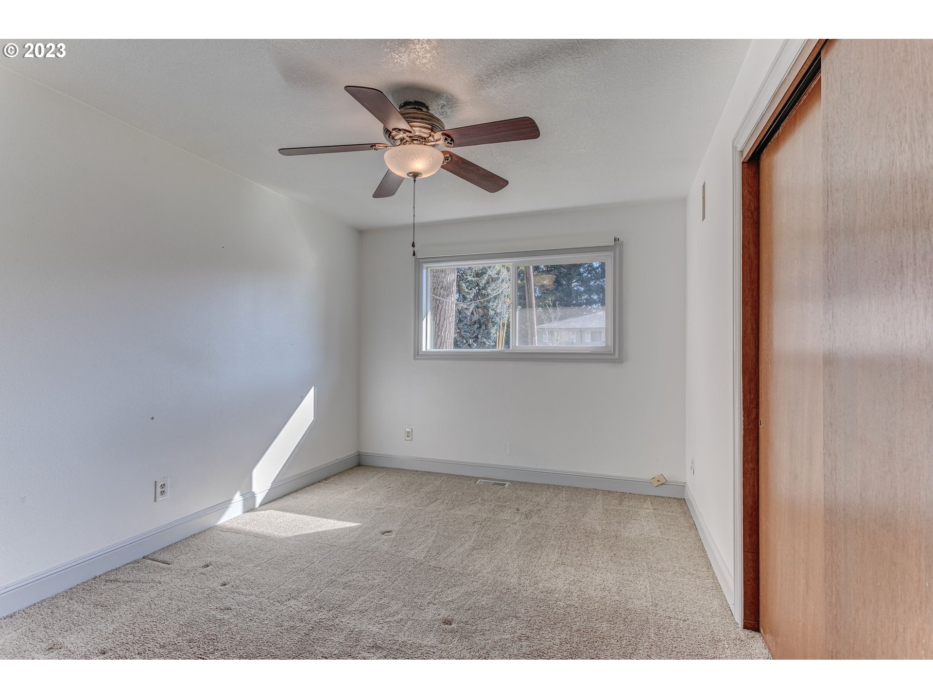21321 Southeast Alder Street Gresham, OR 97030 - Photo 26 of 39 a view of an empty room with a window