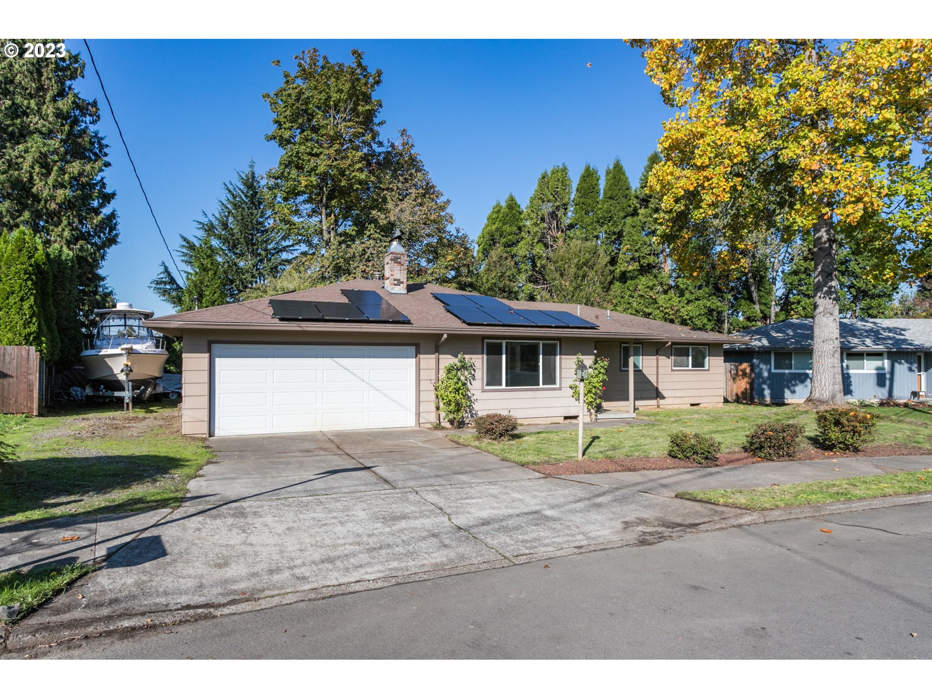 21321 Southeast Alder Street Gresham, OR 97030 - Photo 35 of 39 a front view of a house with a yard and garage