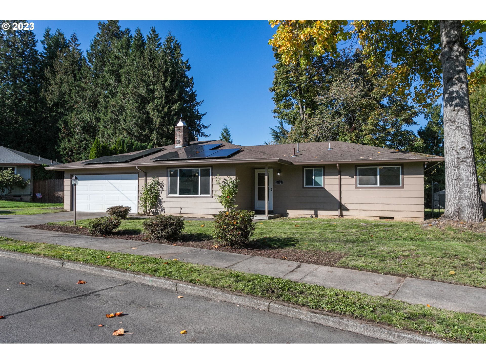 21321 Southeast Alder Street Gresham, OR 97030 - Photo 36 of 39 a front view of a house with a yard