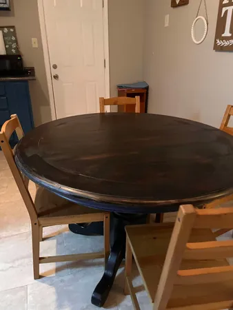 a kitchen with wooden cabinets and a stove top oven
