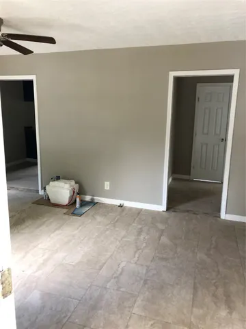 a room with a window and a table