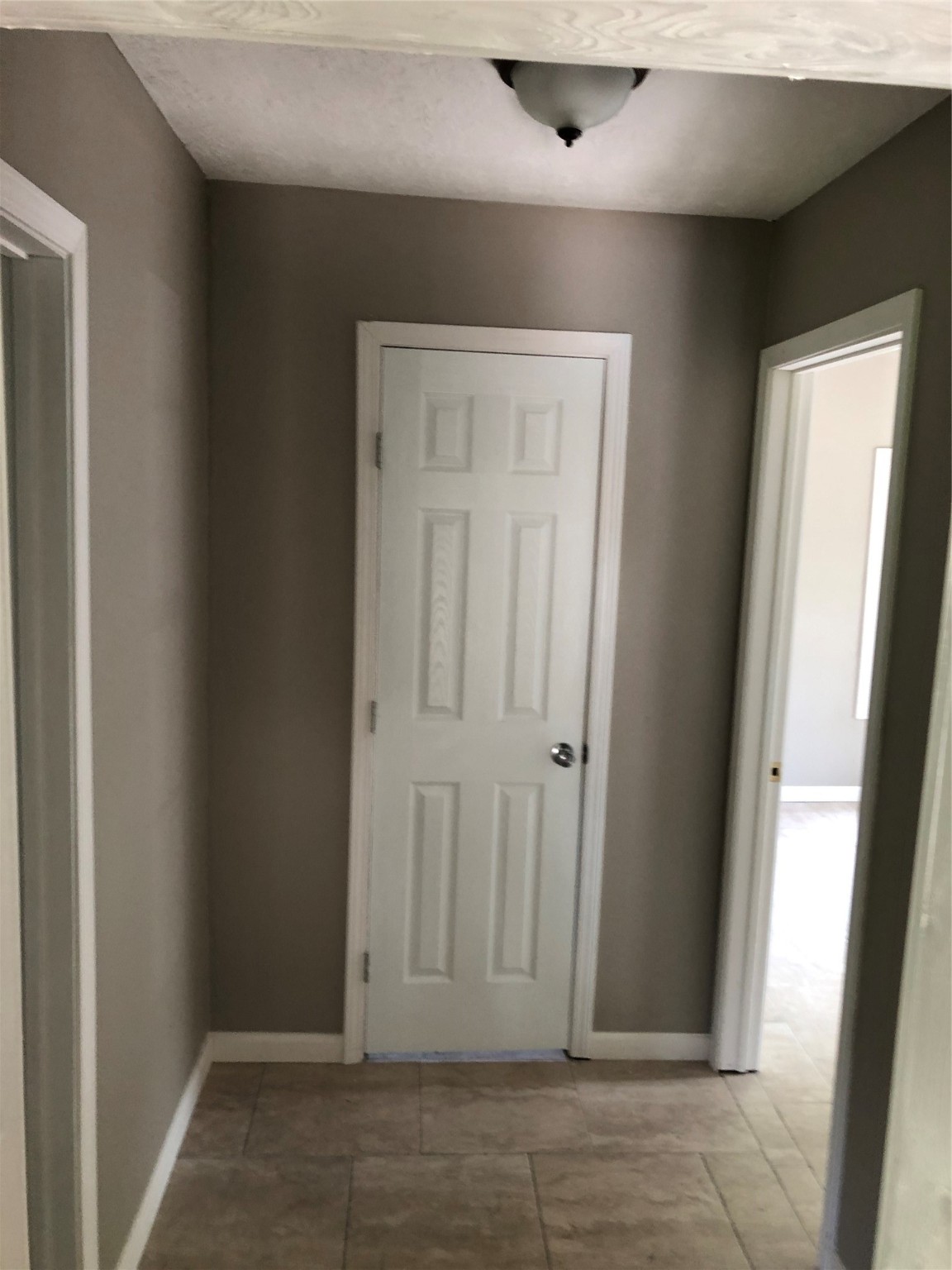 695 Grimes Avenue Silsbee, TX 77656 - Photo 27 of 29 an empty room with windows