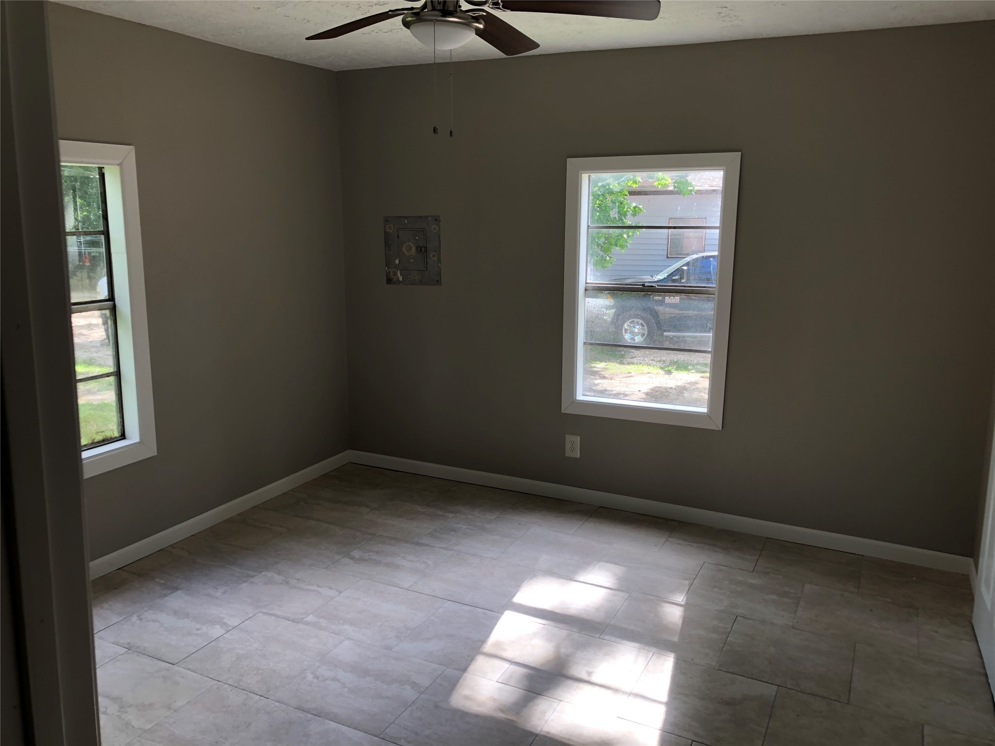 695 Grimes Avenue Silsbee, TX 77656 - Photo 28 of 29 an empty room with windows