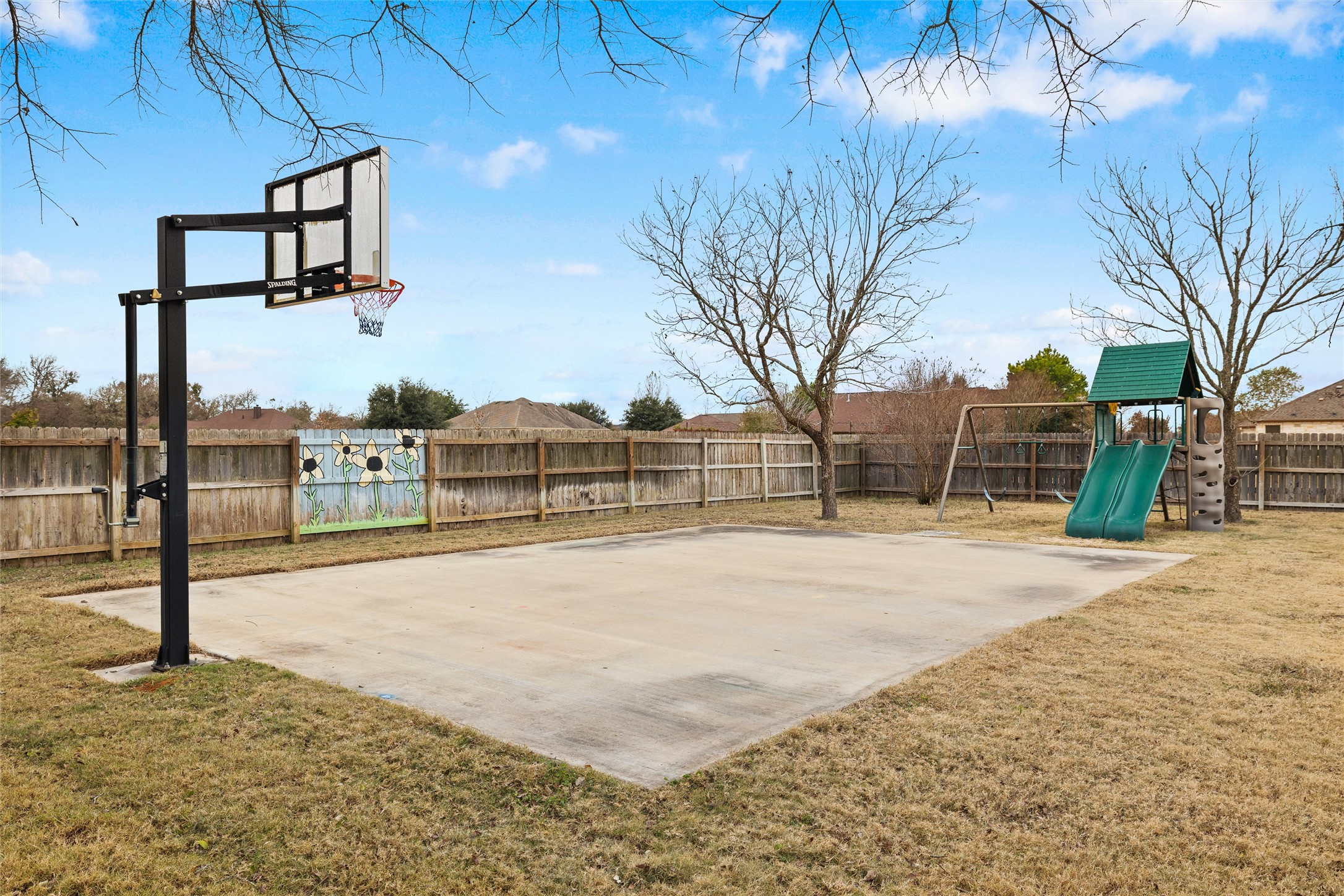 106 Fallow Way Bastrop, TX 78602 - Photo 37 of 40 sport court with installed basketball net