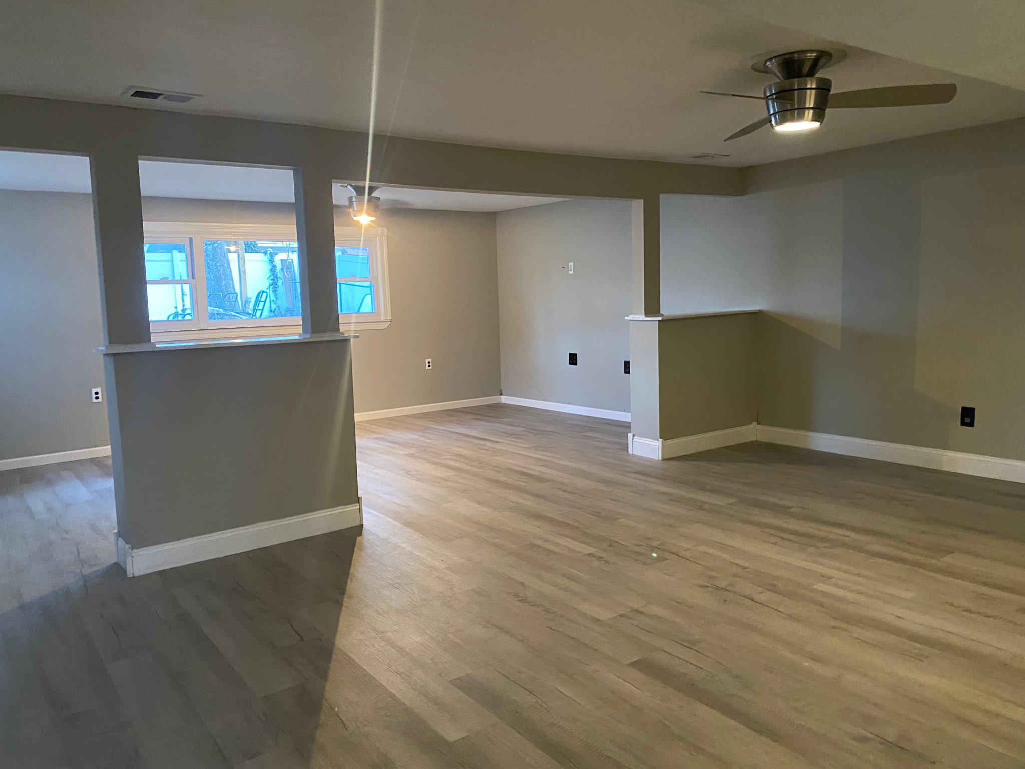 106 Parkview Road Stratford, NJ 08084 - Photo 12 of 27 wooden floor in an empty room with a window