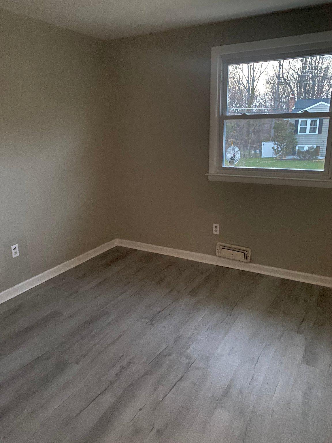 106 Parkview Road Stratford, NJ 08084 - Photo 20 of 27 an empty room with a window
