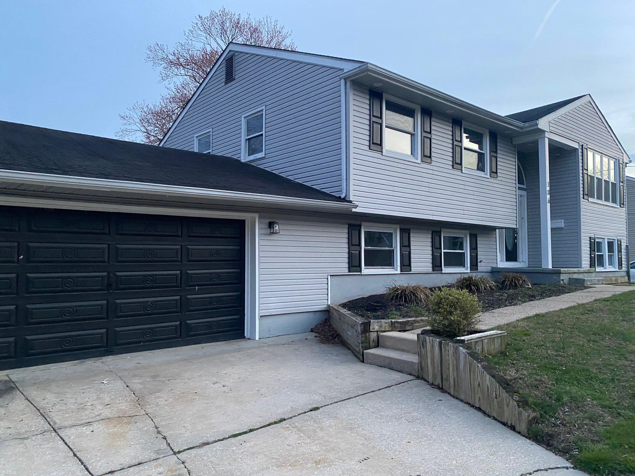106 Parkview Road Stratford, NJ 08084 - Photo 3 of 27 a front view of a house with a yard