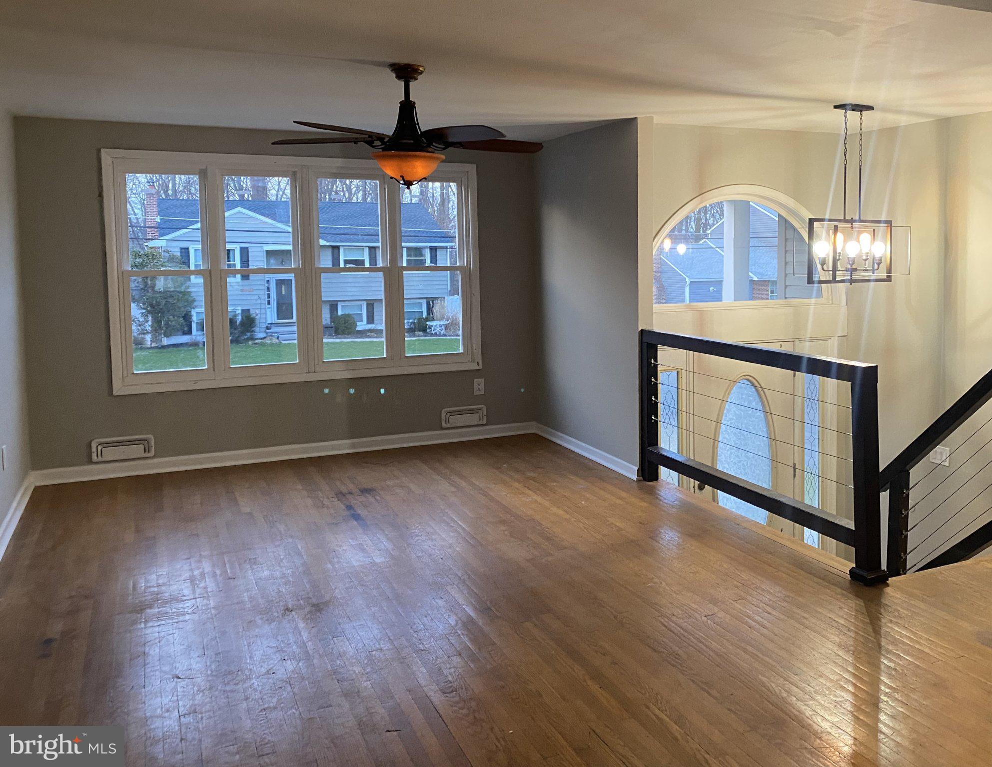 106 Parkview Road Stratford, NJ 08084 - Photo 5 of 27 a view of livingroom with furniture wooden floor and window
