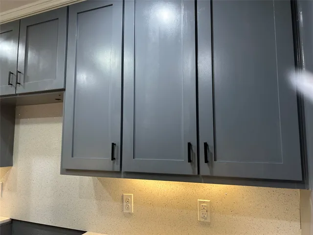 an empty room with wooden floor