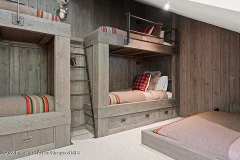 a house view with a sitting space and garden