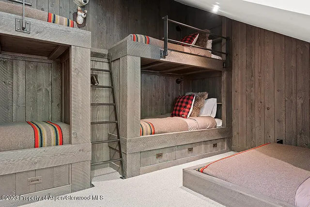 a house view with a sitting space and garden