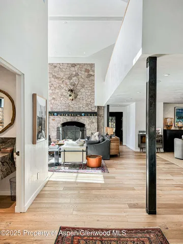 a kitchen with stainless steel appliances granite countertop a sink and a stove