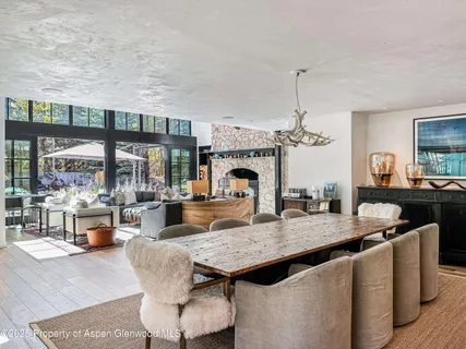 a large kitchen with stainless steel appliances granite countertop a stove and a sink