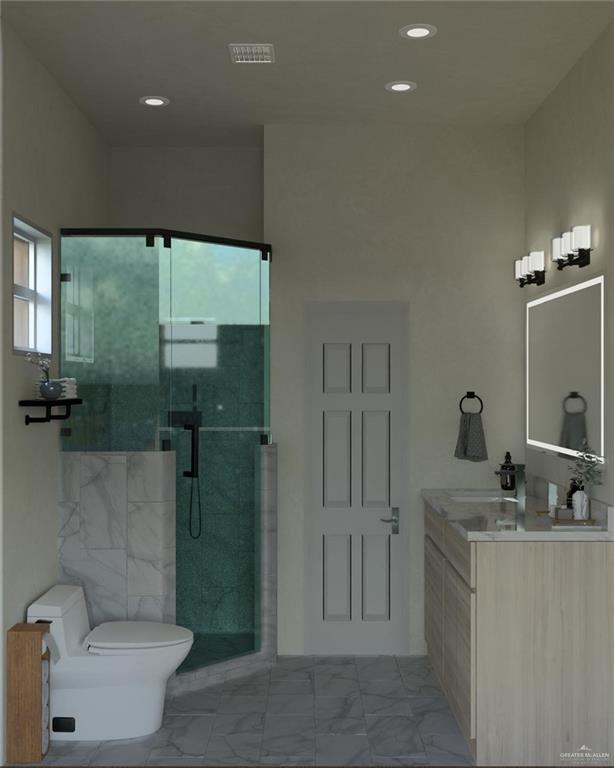 2909 Santa Amanda, Unit 1 Weslaco, TX 78596 - Photo 9 of 10 a bathroom with a double vanity sink toilet and shower